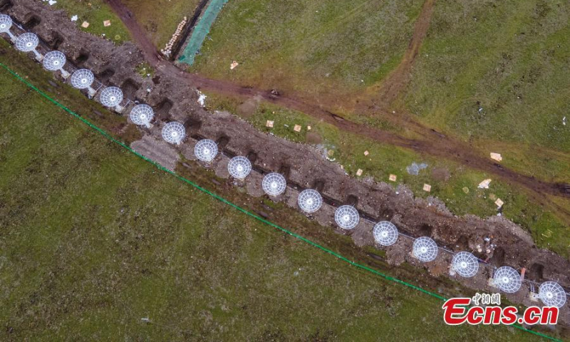 Aerial view shows the parabolic antennas in a circle in Daocheng county, Ganzi Ganzi Tibetan Autonomous Prefecture, southwest China's Sichuan Province, June 29, 2022. (Photo: China News Service/Liu Zhongyan)