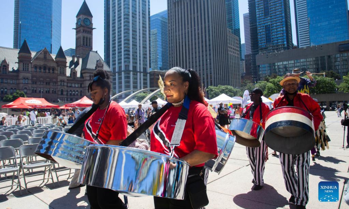 A steel band performs during the official launch ceremony of the 2022 Toronto Caribbean Carnival in Toronto, Canada, on July 7, 2022. As a spectacular display of Caribbean music, costumes and culture, the annual event is held here from July 7 to July 31. Photo:Xinhua