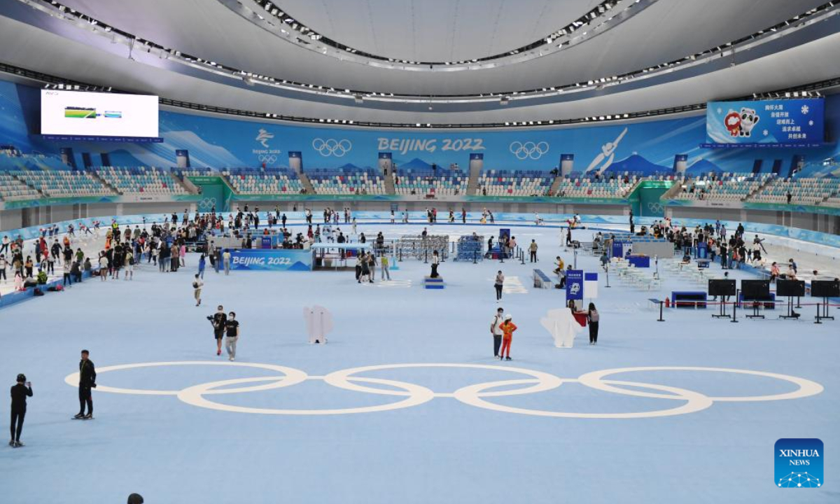 People visit the National Speed Skating Oval in Beijing, capital of China, July 9, 2022. The National Speed Skating Oval, also known as the Ice Ribbon, opened to the public on Saturday. Photo:Xinhua