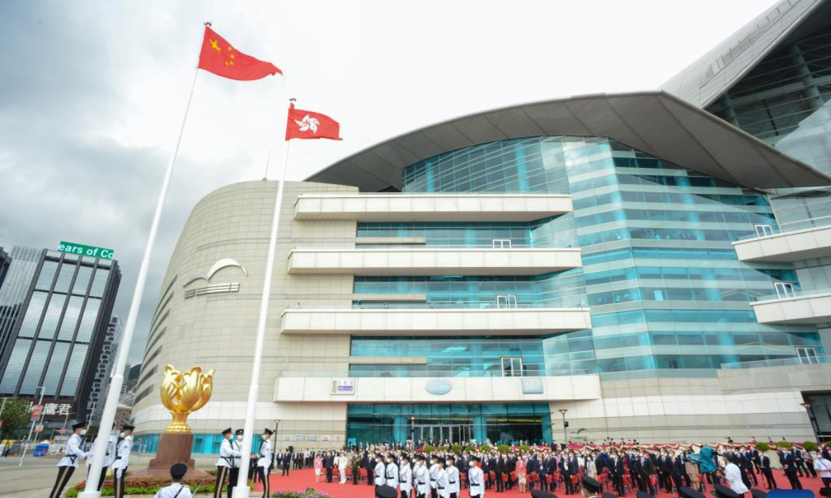 A flag-raising ceremony is held by the government of the Hong Kong Special Administrative Region to celebrate the 25th anniversary of Hong Kong's return to the motherland, at the Golden Bauhinia Square in Hong Kong, south China, July 1, 2022. Photo:Xinhua