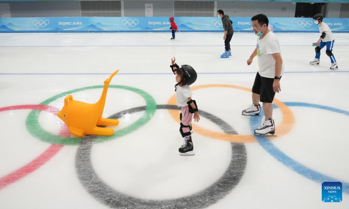 Tourists skate at the National Speed Skating Oval in Beijing, capital of China, July 9, 2022. The National Speed Skating Oval, also known as the Ice Ribbon, opened to the public on Saturday. Photo:Xinhua