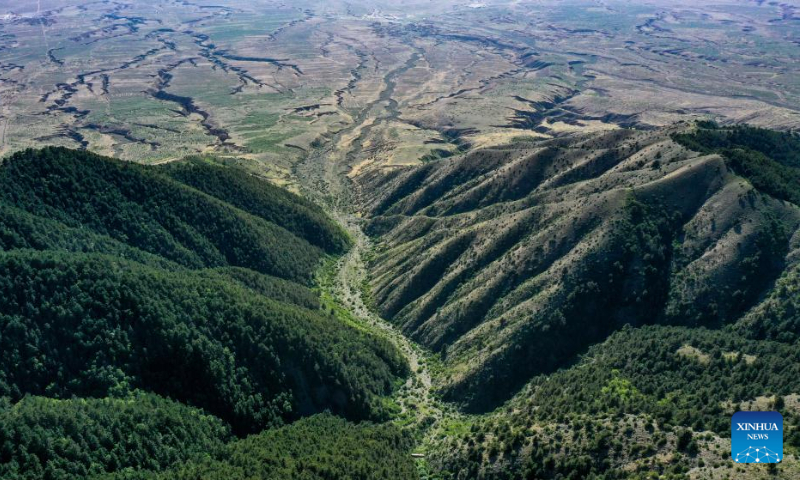Aerial photo taken on June 23, 2022 shows a view of Luoshan Mountain in Wuzhong City, northwest China's Ningxia Hui Autonomous Region. (Xinhua/Feng Kaihua)