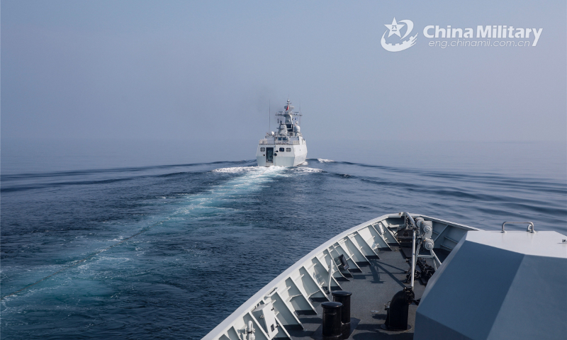 Two vessels attached to a frigate flotilla with the navy under PLA Southern Theater Command conduct underway replenishment-at-sea during a combat training exercise aimed at enhancing coordination on June 12, 2022. (eng.chinamil.com.cn/Photo by Zhang Bin)