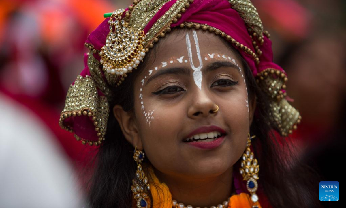 A devotee is seen during a celebration of the Rath Yatra festival in Kathmandu, Nepal, July 1, 2022. Photo:Xinhua