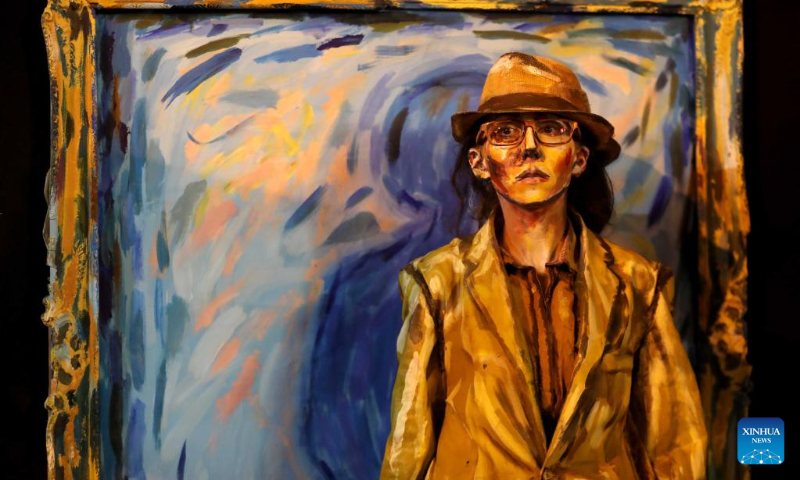 An artist performs during the Rehovot International Live Statues Festival in Rehovot, Israel, on July 5, 2022. The festival is held from July 5 to 7 with more than 40 artists participating. (Photo by Gil Cohen Magen/Xinhua)