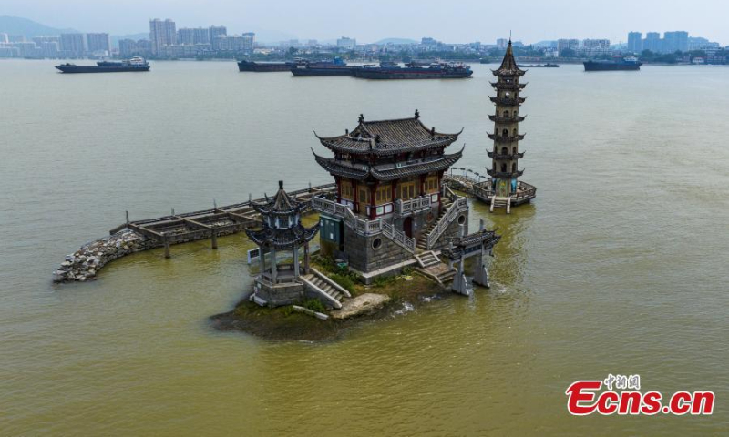 Photo shows the flooded historic site of Luoxingdun Island in Poyang Lake of Lushan City, east China's Jiangxi Province, June 25, 2022. The water level of Poyang Lake, China's biggest freshwater lake, continued to rise due to the heavy rainfall. (Photo: China News Service/Ma Gang)