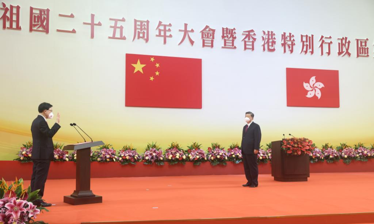Chinese President Xi Jinping, also general secretary of the Communist Party of China Central Committee and chairman of the Central Military Commission, administers oath of office to the sixth-term Chief Executive of the Hong Kong Special Administrative Region (HKSAR) John Lee at the Hong Kong Convention and Exhibition Center, south China's Hong Kong, July 1, 2022. Photo:Xinhua