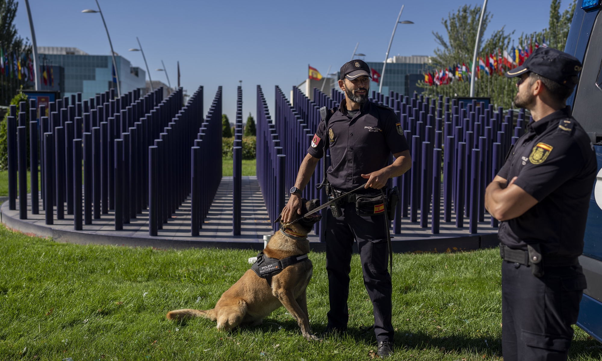 Police officers stand guard outside the NATO Summit building ahead of the summit in Madrid, Spain, Monday, June 27, 2022. Photo: VCG