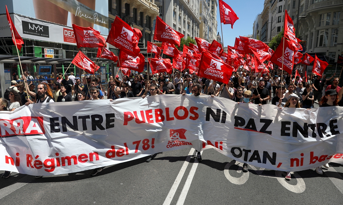 Demonstrators take part in an anti-NATO protest ahead of the NATO summit in Madrid, Spain, June 26, 2022. Photo: IC