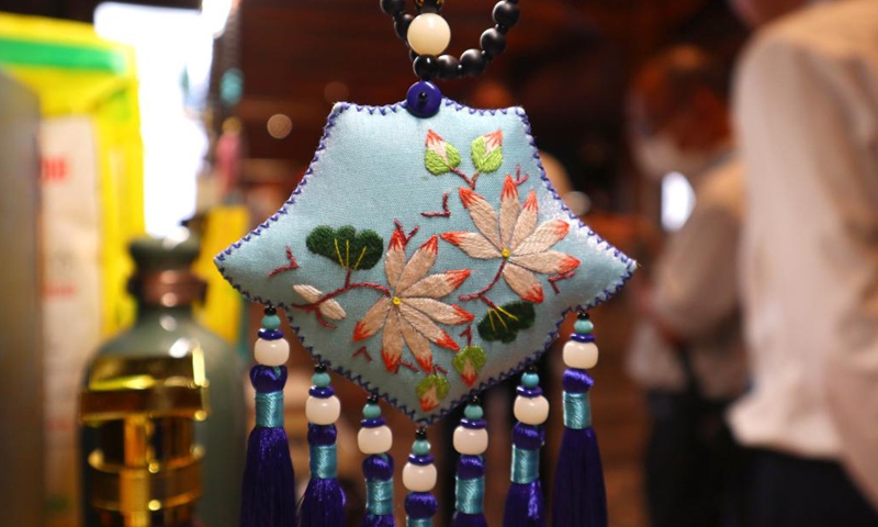 Photo taken on June 27, 2022 shows a pouch displayed during a culture and tourism commodities fair in Qufu of Jining, east China's Shandong Province. A culture and tourism commodities fair to promote culture and tourism industry in Shandong Province is held here Monday. Photo: Xinhua)
