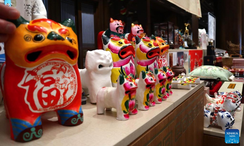 Photo taken on June 27, 2022 shows tiger-shaped artwares from Weifang City of east China's Shandong Province during a culture and tourism commodities fair in Qufu, Jining City of Shandong. A culture and tourism commodities fair to promote culture and tourism industry in Shandong Province is held here Monday. (Photo: Xinhua)