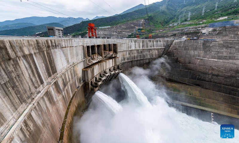 Aerial photo taken on June 28, 2022 shows a view of the Baihetan hydropower station, which straddles the provinces of Yunnan and Sichuan in southwest China. Tuesday marks the first anniversary of the operation of the first two generating units of the Baihetan hydropower station, a major project in China's west-east power transmission program. The station has a total installed capacity of 16 million kilowatts.(Photo: Xinhua)