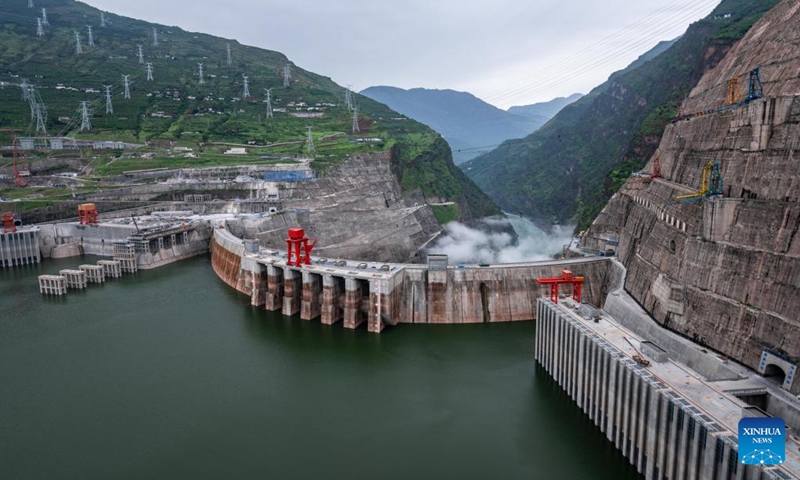 Aerial photo taken on June 28, 2022 shows a view of the Baihetan hydropower station, which straddles the provinces of Yunnan and Sichuan in southwest China. Tuesday marks the first anniversary of the operation of the first two generating units of the Baihetan hydropower station, a major project in China's west-east power transmission program. The station has a total installed capacity of 16 million kilowatts.(Photo: Xinhua)
