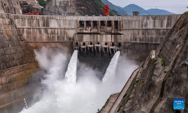 Aerial photo taken on June 28, 2022 shows a view of the Baihetan hydropower station, which straddles the provinces of Yunnan and Sichuan in southwest China. Tuesday marks the first anniversary of the operation of the first two generating units of the Baihetan hydropower station, a major project in China's west-east power transmission program. The station has a total installed capacity of 16 million kilowatts.(Photo: Xinhua)