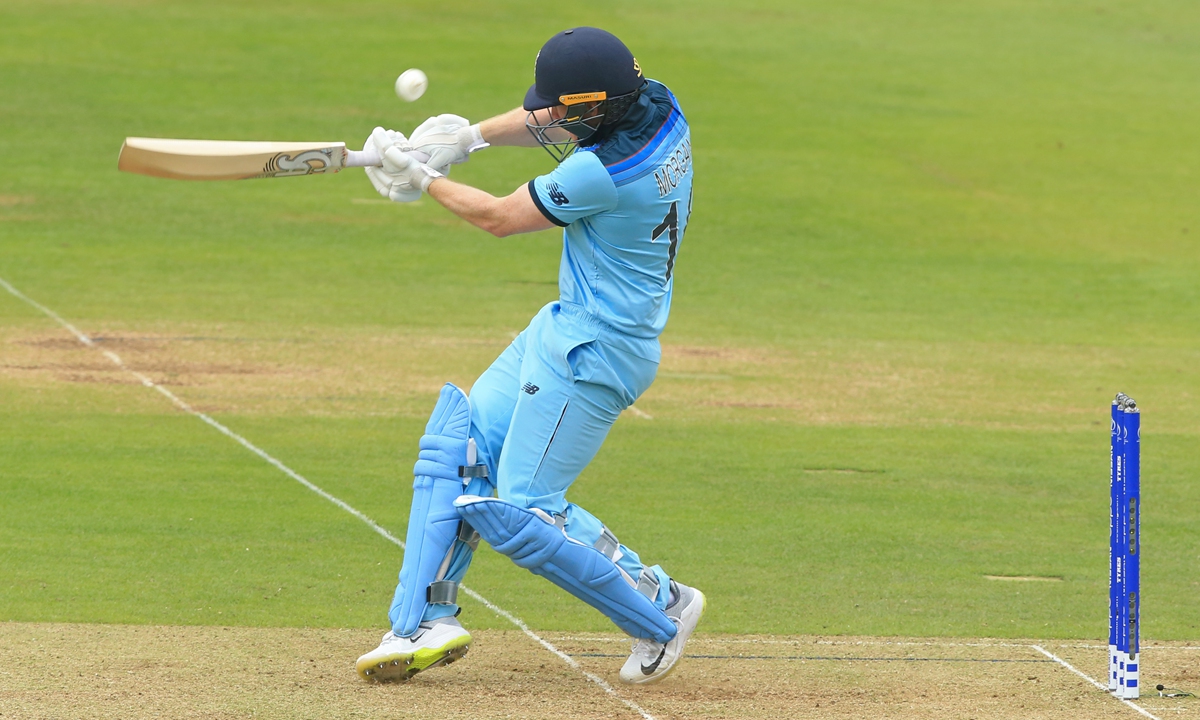 Eoin Morgan of England plays a shot and is caught out by Pat Cummins of Australia during the England v Australia, ICC Cricket World Cup match, at Lords, London, England, on June 25, 2019. Photo: VCG