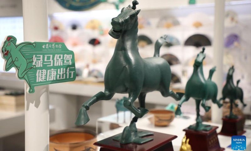 Souvenirs featuring an ancient bronze horse statue are seen at a store in Gansu Provincial Museum in Lanzhou, capital of northwest China's Gansu Province, June 28, 2022. The bronze horse statue, popularly known as Bronze Galloping Horse Treading on a Flying Swallow, was unearthed in 1960s from the Leitai Tomb of the Eastern Han Dynasty (25-220 AD) in Wuwei and is now preserved in the Gansu Provincial Museum.(Photo: Xinhua)