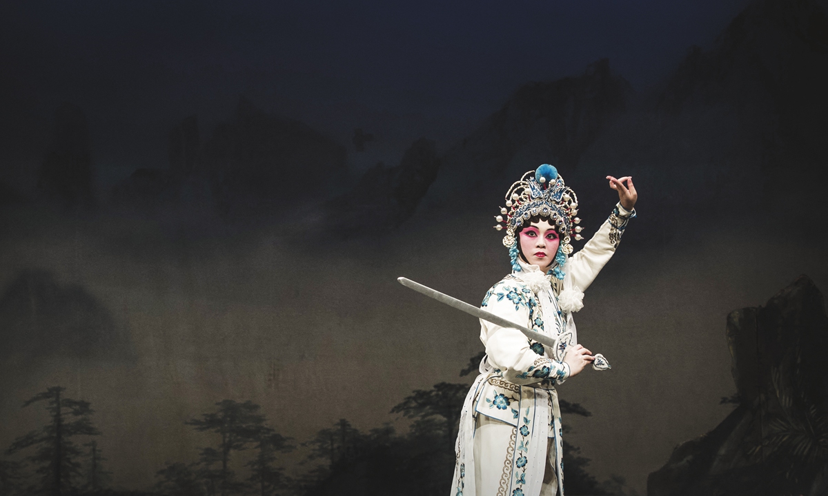 A performer poses during a Cantonese Opera Photo: VCG