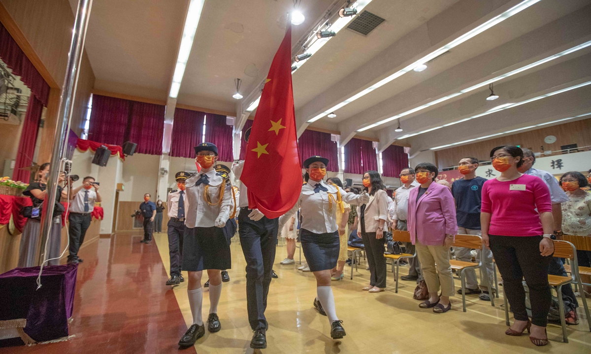 Fukien Secondary School in Hong Kong holds the Chinese national flag-raising ceremony. Photo: IC
