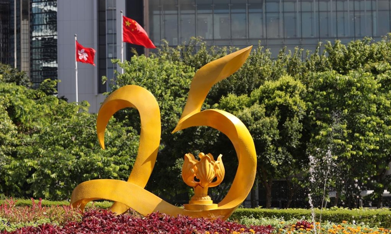 Photo taken on June 28, 2022 shows an installation marking the 25th anniversary of Hong Kong's return to the motherland in Hong Kong, south China. July 1 this year marks the 25th anniversary of Hong Kong's return to the motherland.(Photo: Xinhua)