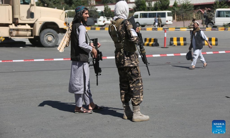 Taliban members stand guard near the conference venue of the Loya Jirga in Kabul, Afghanistan, June 30, 2022. The much-awaited Loya Jirga or grand assembly of religious scholars and elders opened in Afghanistan's capital Kabul on Thursday, the Afghan caretaker government's chief spokesman Zabihullah Mujahid said.(Photo: Xinhua)