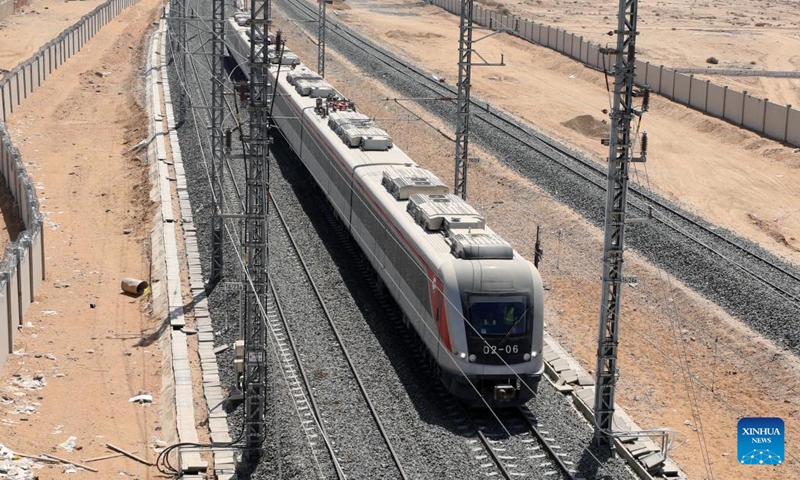 Photo shows the Light Rail Transit train during a trial run at Adly Mansour station in Cairo, Egypt, on June 30, 2022. Egypt is constructing its first Light Rail Transit (LRT) system, which will be the first mass transportation means linking the New Administrative Capital to Greater Cairo after it is finished.(Photo: Xinhua)