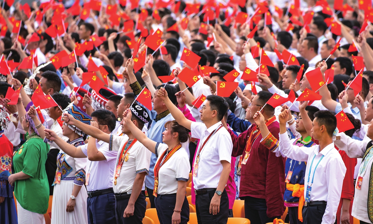 People celebrate the 100th founding anniversary of the Communist Party of China, in Tiananmen Square in Beijing, on July 1, 2021. Photo: VCG