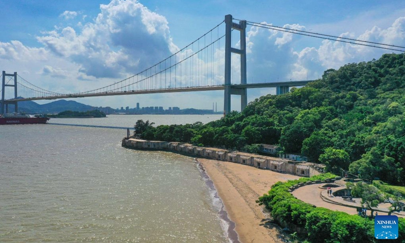 Aerial photo taken on June 23, 2020 shows a view of the Humen Bridge, which links Guangzhou City and Dongguan City, in south China's Guangdong Province. With the building of traffic arteries, the connectivity in the Guangdong-Hong Kong-Macao Greater Bay Area has been continuously improved. The convenient transport network has also enhanced the logistics efficiency within the area and injected new vitality into local development of business.(Photo: Xinhua)