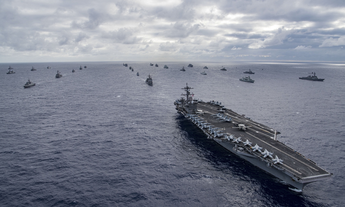 International Navy ships assemble for a photo exercise off the coast of Hawaii during the Rim of Pacific Exercise (RIMPAC) 2018, on July 26, 2018 in the Pacific Ocean. Photo: AFP 