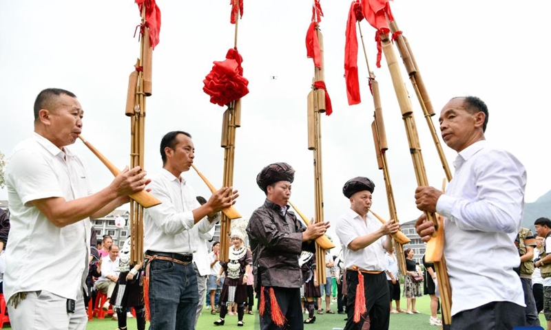 People play lusheng, a traditional reed-pipe wind instrument, to celebrate Liuyueliu, an ethnic festival, in Jianhe County of Qiandongnan Miao and Dong Autonomous Prefecture, southwest China's Guizhou Province, July 2, 2022.Photo:Xinhua