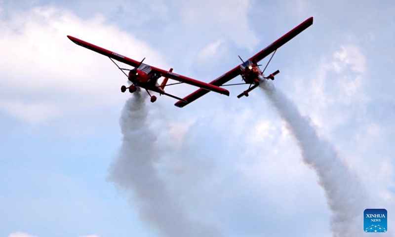 Aeroprakt aircraft perform during an acrobatic display at the Fly in Limbazi air show in Limbazi, Latvia, on July 2, 2022.Photo:Xinhua