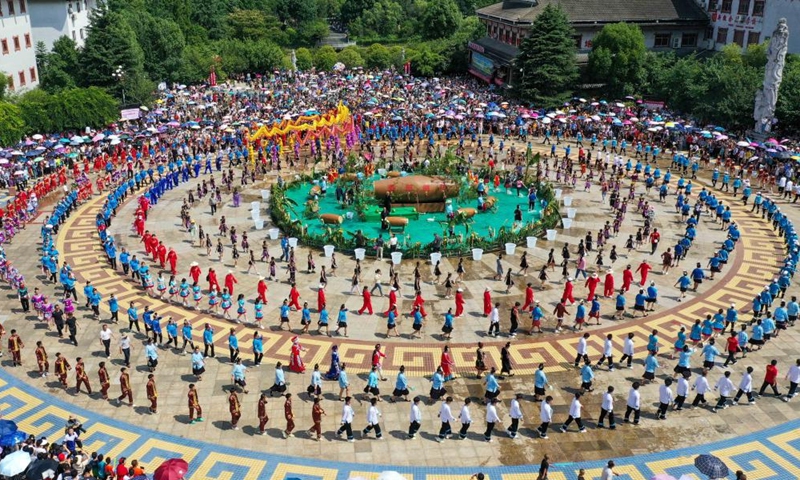 Aerial photo taken on July 2, 2022 shows people taking part in activities to celebrate Liuyueliu, an ethnic festival, in Jianhe County of Qiandongnan Miao and Dong Autonomous Prefecture, southwest China's Guizhou Province. Annual celebration of the ethnic festival Liuyueliu lasts from July 2 to 5 here in Jianhe County.Photo:Xinhua
