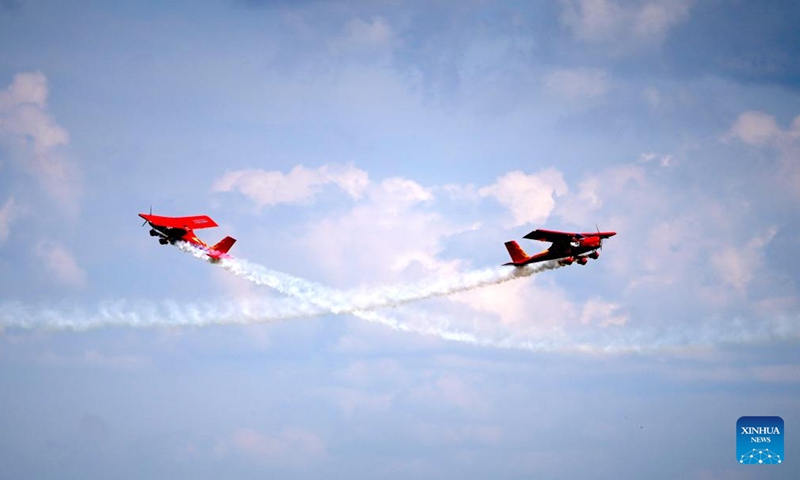 Aeroprakt aircraft perform during an acrobatic display at the Fly in Limbazi air show in Limbazi, Latvia, on July 2, 2022.Photo:Xinhua