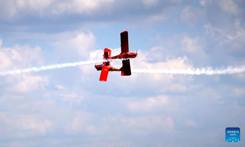 Aeroprakt aircraft perform during an acrobatic display at the Fly in Limbazi air show in Limbazi, Latvia, on July 2, 2022.Photo:Xinhua