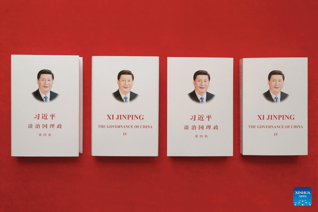 Photo shows the fourth volume of Xi Jinping: The Governance of China in both Chinese and English. The fourth volume of Xi Jinping: The Governance of China has been published by Foreign Languages Press in both Chinese and English. The book will be available at home and abroad.Photo:Xinhua