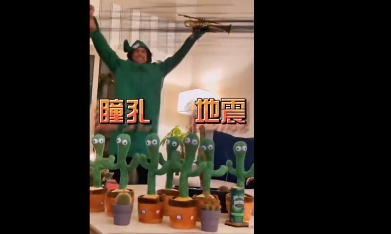 Screenshot of a foreigner play with Chinese dancing toys. Photo: web