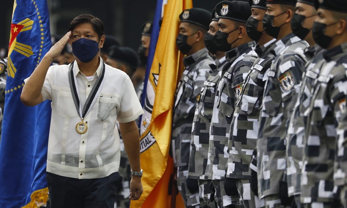Philippine President Ferdinand Bongbong Marcos Jr. walks past troopers of the Presidential Security Group (PSG) during PSG Change of Command ceremonies at Malacanang Palace grounds in Manila, Philippines, on July 4, 2022. Photo: IC 