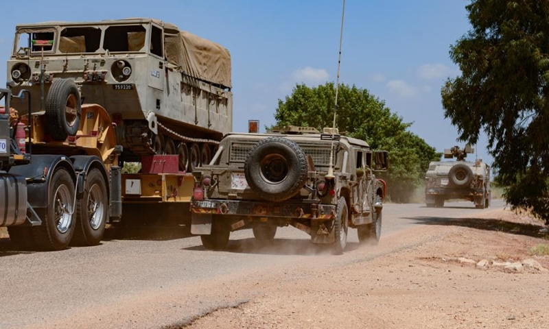 Israeli military vehicles patrol the border with Lebanon near the Israeli Kibbutz of Malkia, on July 3, 2022.Photo:Xinhua