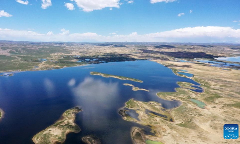 Aerial photo taken on July 3, 2022 shows the Xingxinghai Lake in Maduo County of Golog Tibetan Autonomous Prefecture, northwest China's Qinghai Province. Sanjiangyuan, which means the source of three rivers, is home to the headwaters of the Yangtze, Yellow and Lancang rivers. The area provides the lower reaches of these major rivers with more than 60 billion cubic meters of water annually.(Photo: Xinhua)