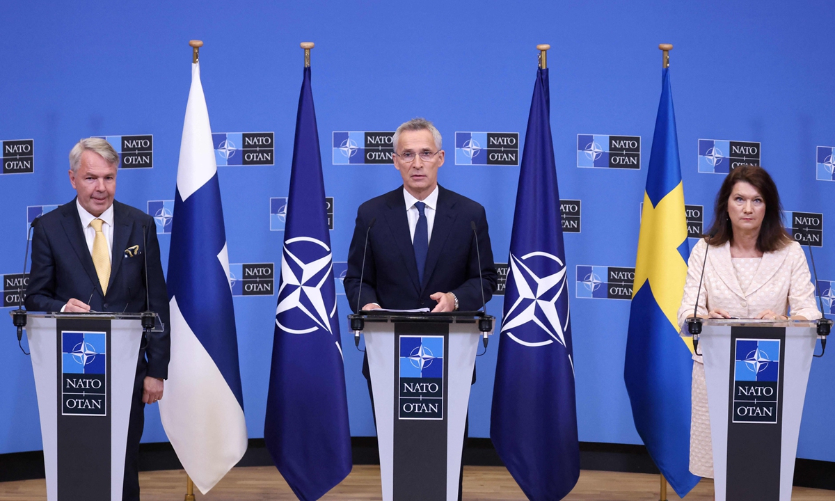 (Left to right) Finnish Foreign Minister Pekka Haavisto, NATO Secretary General Jens Stoltenberg and Swedish Ministry for Foreign Affairs Anne Linde give a press conference after the signing of the accession protocols of Finland and Sweden at the NATO headquarters in Brussels on July 5, 2022. Photo: VCG