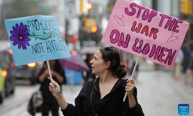 A woman participates in an abortion rights rally outside Vancouver Art Gallery in Vancouver, British Columbia, Canada, on July 4, 2022.(Photo: Xinhua)