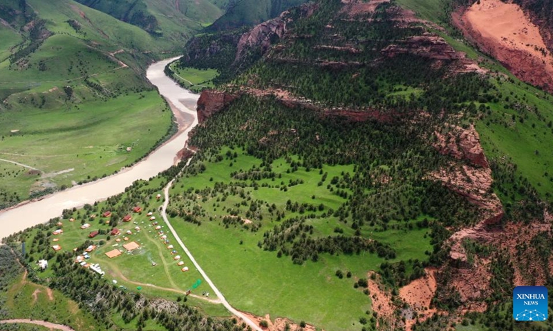 Aerial photo taken on June 29, 2022 shows the view of Angsai Canyon in Zaduo County, Yushu Tibetan Autonomous Prefecture, northwest China's Qinghai Province. Sanjiangyuan, which means the source of three rivers, is home to the headwaters of the Yangtze, Yellow and Lancang rivers. The area provides the lower reaches of these major rivers with more than 60 billion cubic meters of water annually.(Photo: Xinhua)
