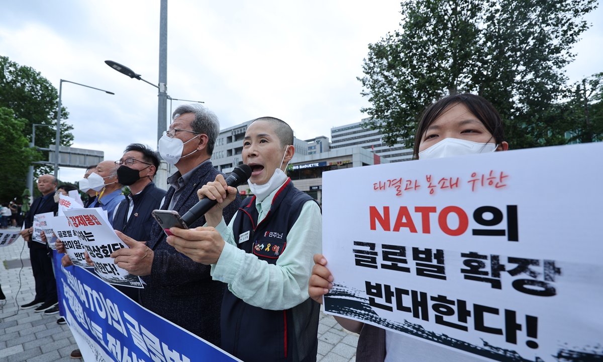 South Korean activists hold a rally near the president's office on June 28 to protest against NATO's invitation of Asia-Pacific countries' leaders to the NATO Summit. Photo: VCG