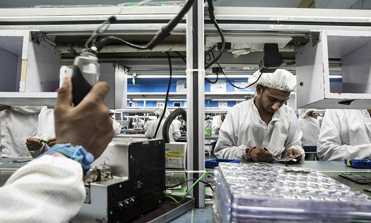 A view of a production line of a smartphone factory in India. Photo: VCG