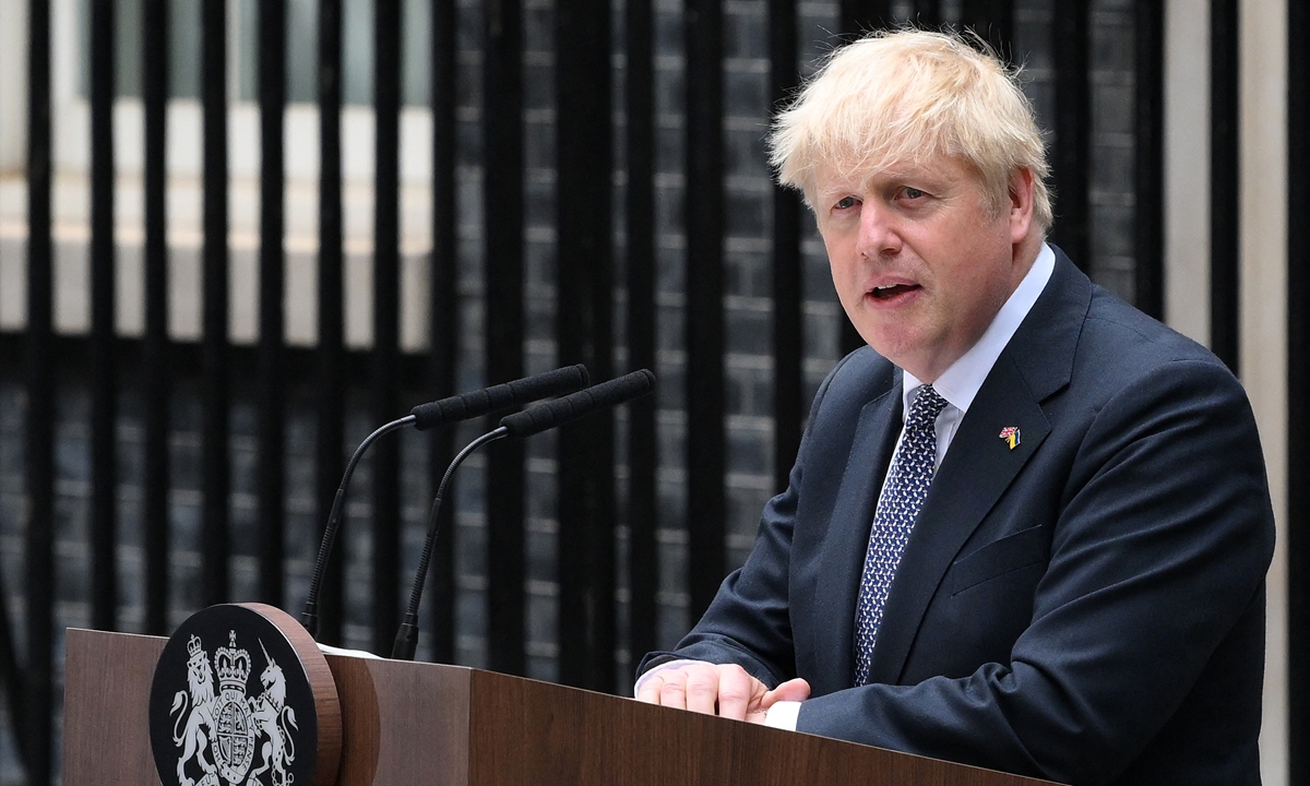 Britain's Prime Minister Boris Johnson makes a statement in front of 10 Downing Street in central London on Thursday.Photo:AFP