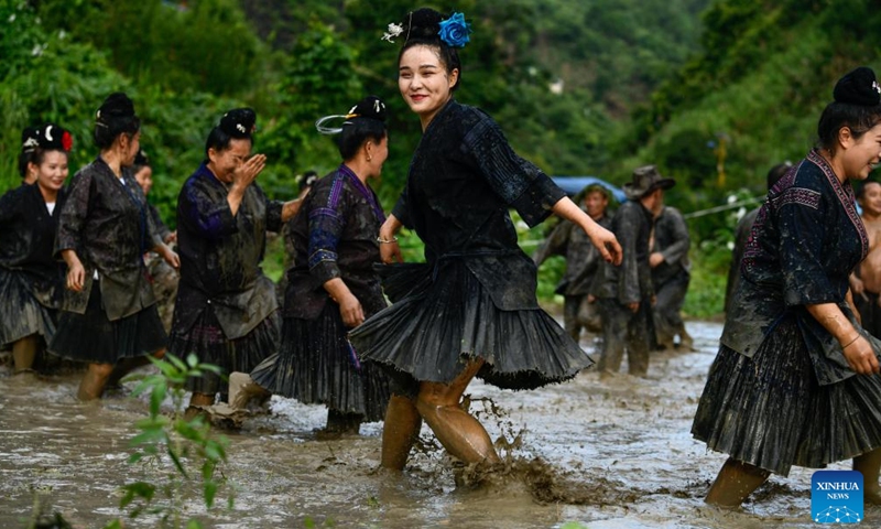 Villagers perform Shuigu (water drum) dance in Jianhe County of Qiandongnan Miao and Dong Autonomous Prefecture, southwest China's Guizhou Province, July 8, 2022.Photo:Xinhua