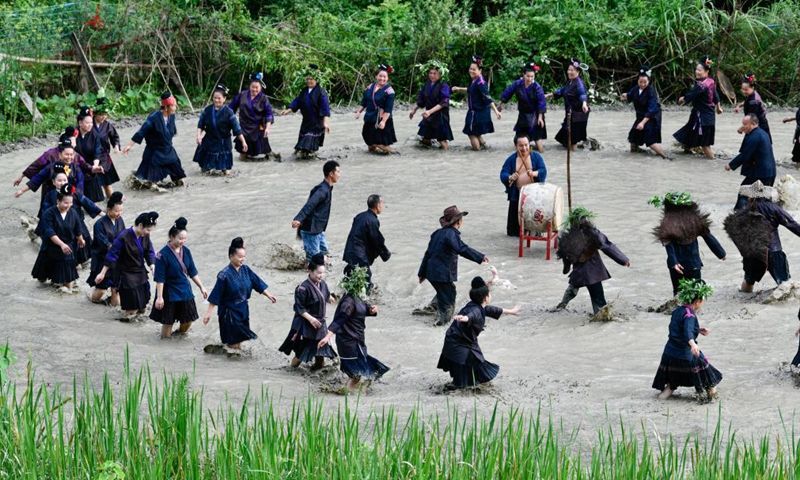 Villagers perform Shuigu (water drum) dance in Jianhe County of Qiandongnan Miao and Dong Autonomous Prefecture, southwest China's Guizhou Province, July 8, 2022.Photo:Xinhua