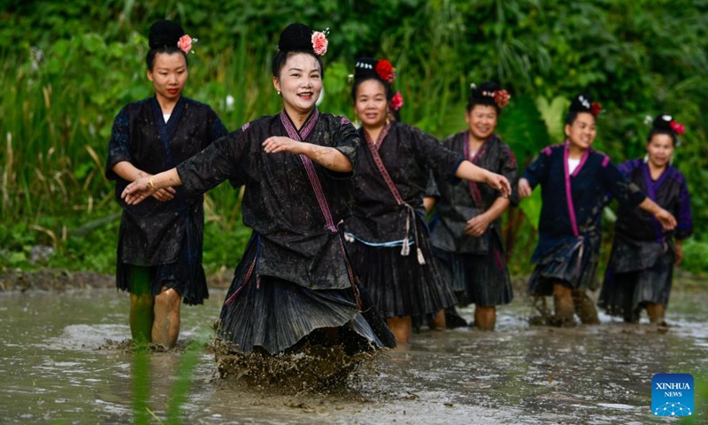 Villagers perform Shuigu (water drum) dance in Jianhe County of Qiandongnan Miao and Dong Autonomous Prefecture, southwest China's Guizhou Province, July 8, 2022.Photo:Xinhua