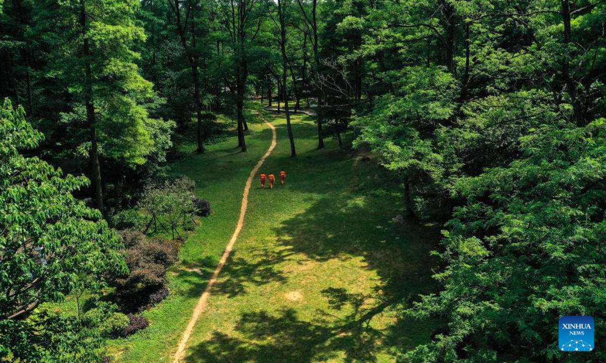 Aerial photo shows staff workers patrolling in Changpoling National Forest Park in Guiyang, southwest China's Guizhou Province, July 13, 2022. Photo:Xinhua