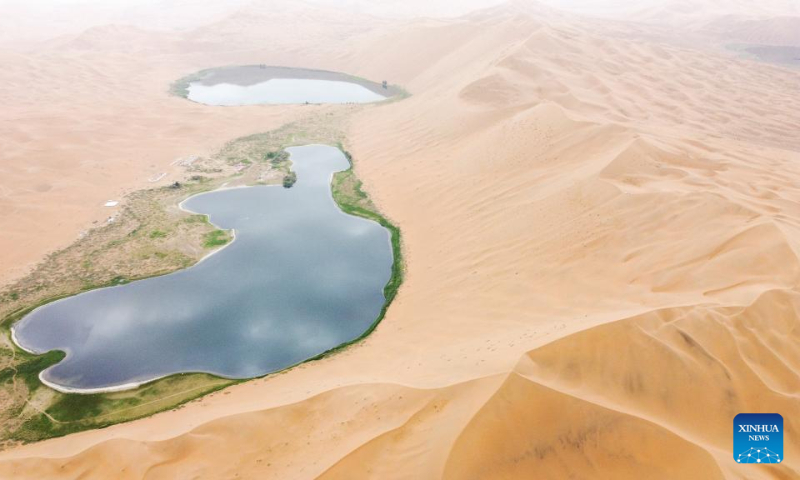 Aerial photo taken on July 13, 2022 shows a view of the Badain Jaran Desert in north China's Inner Mongolia Autonomous Region. (Xinhua/Bei He)