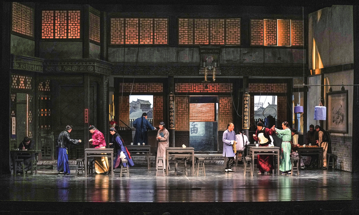 Actors perform a scene from the play Teahouse at the Beijing People's Art Theater.Photo: Xinhua 